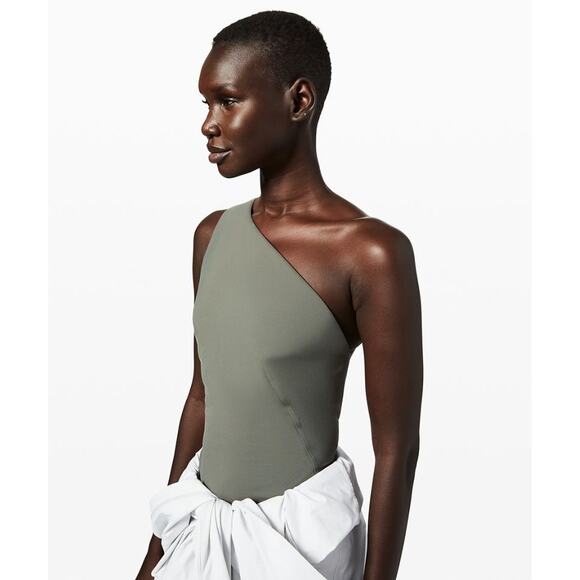 Lululemon Athletica Tops - NWT Lululemon Aer Bodysuit *lululemon lab
Palm Deco Sz 2